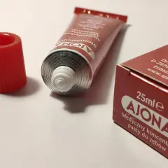 Pasta Ajona, medyczny koncentrat do zębów. Zastanawiasz się nad jej stosowaniem i potencjalnymi skutkami ubocznymi? Oto opakowanie.