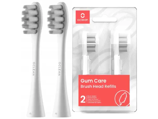 Dwa białe, zapakowane końcówki do szczoteczki Oclean Gum Care. Różne rodzaje końcówek Oclean zapewniają delikatną pielęgnację dziąseł.